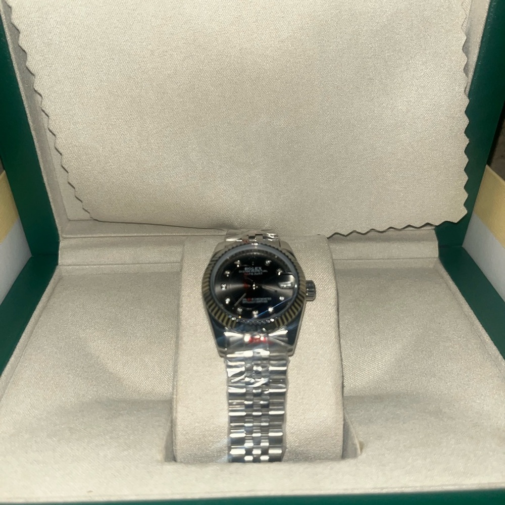 Rolex Silver and Black Watch with Green Card Holder